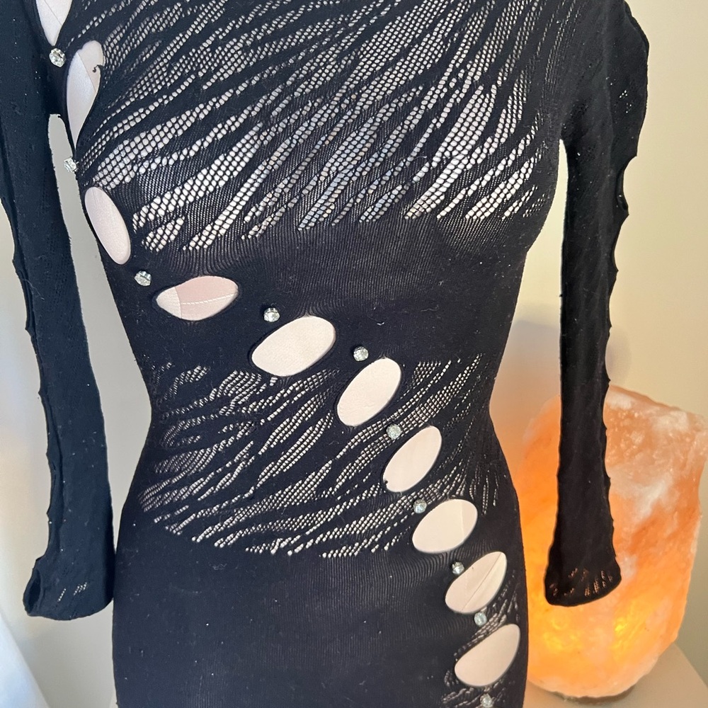 Exotic Black Dress with Unique Cutout Design